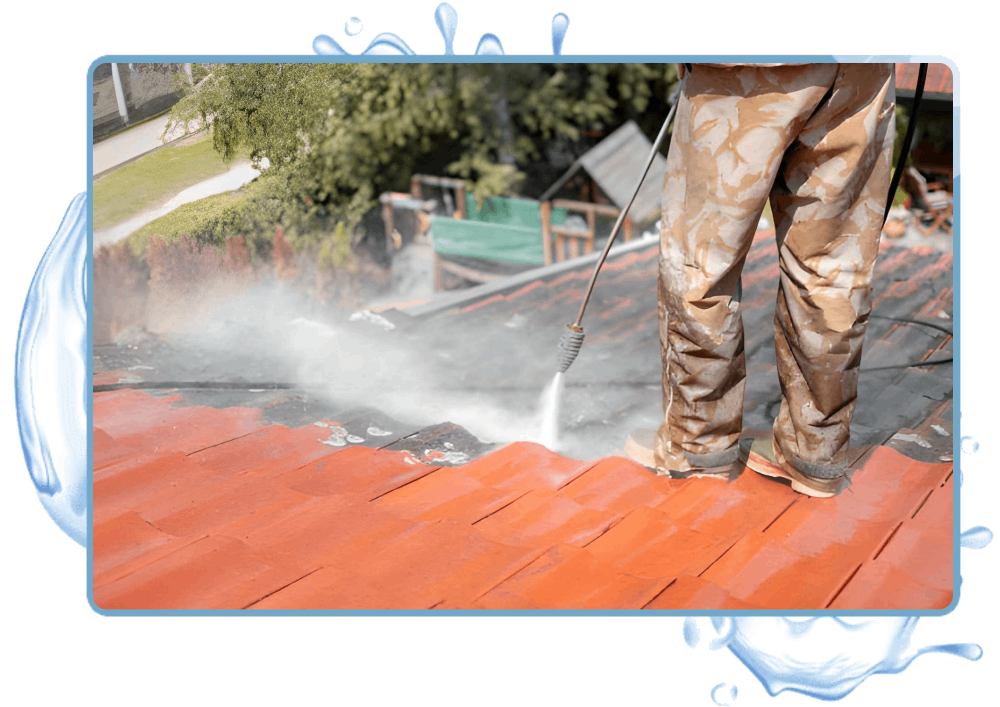 Man Cleaning Roof using Pressure washing