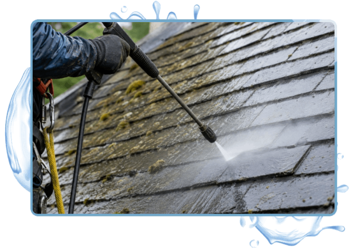 Man cleaning Slate Roof with moss